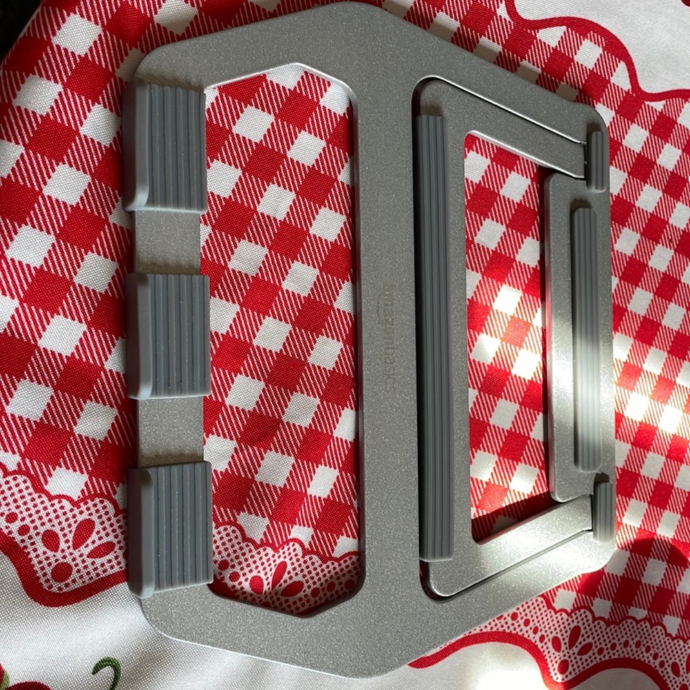 Tablets holder silver. Silver liked new. Never used.